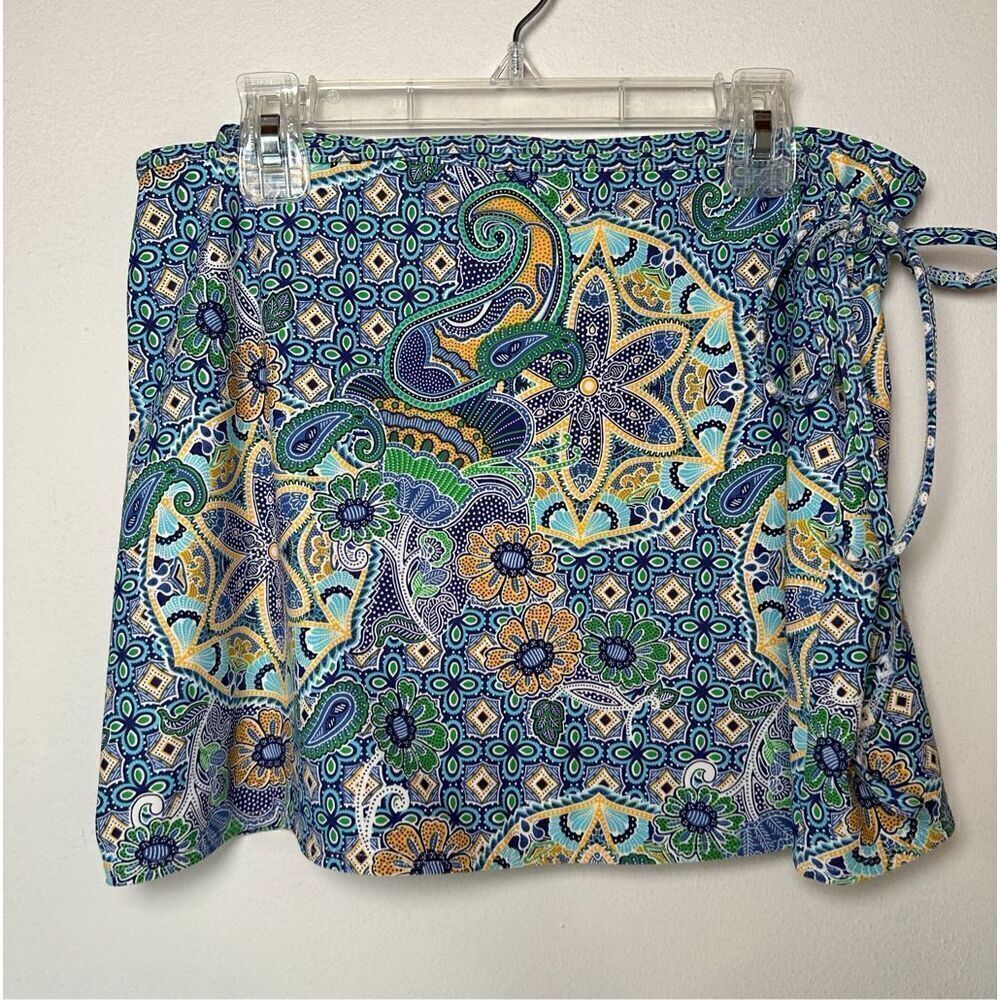 Athleta women’s multi-color floral mini wrap skirt size Medium. #40-1403